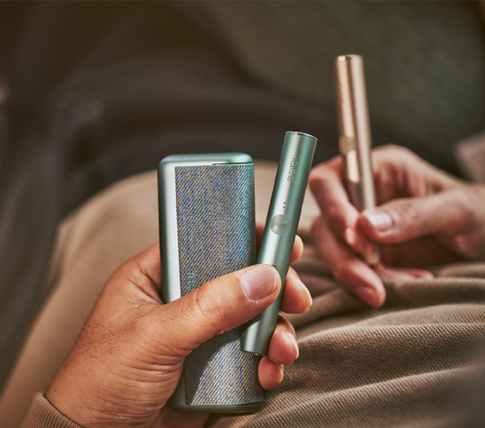 person-holding-iluma